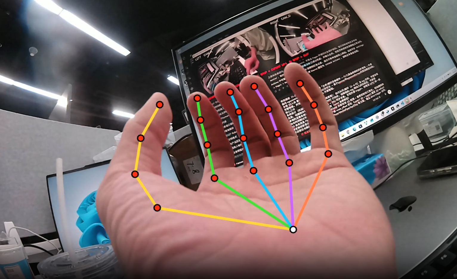 Hand skeleton detected from an inward-facing wrist camera with an open palm